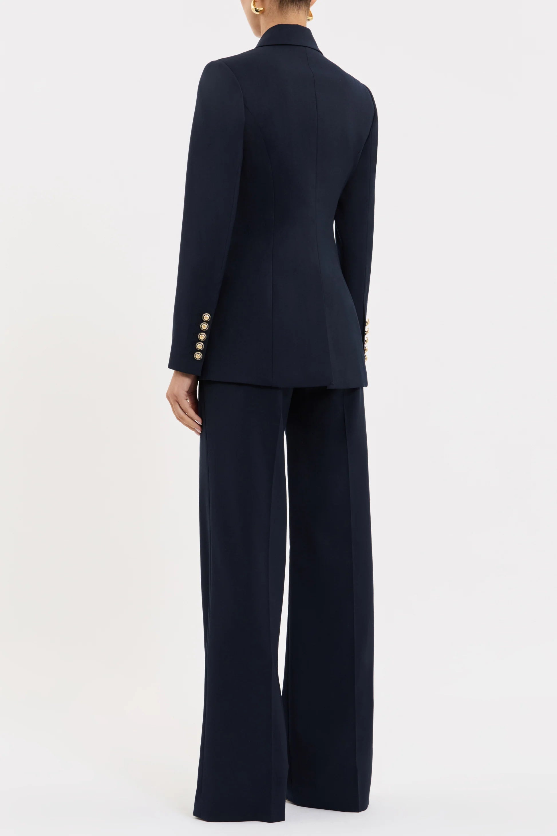 Navy suit with wide-leg pants on a white background