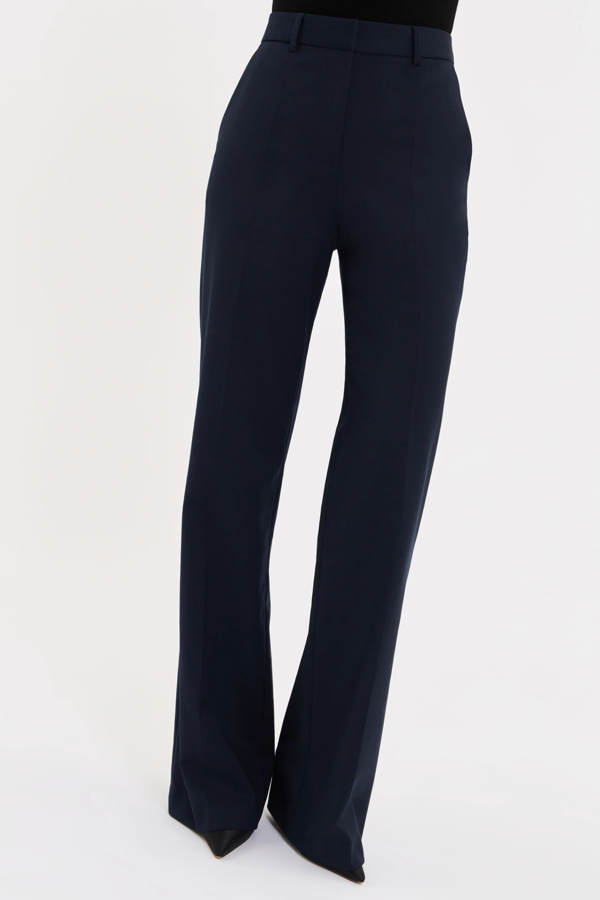 Black flared pants on a white background
