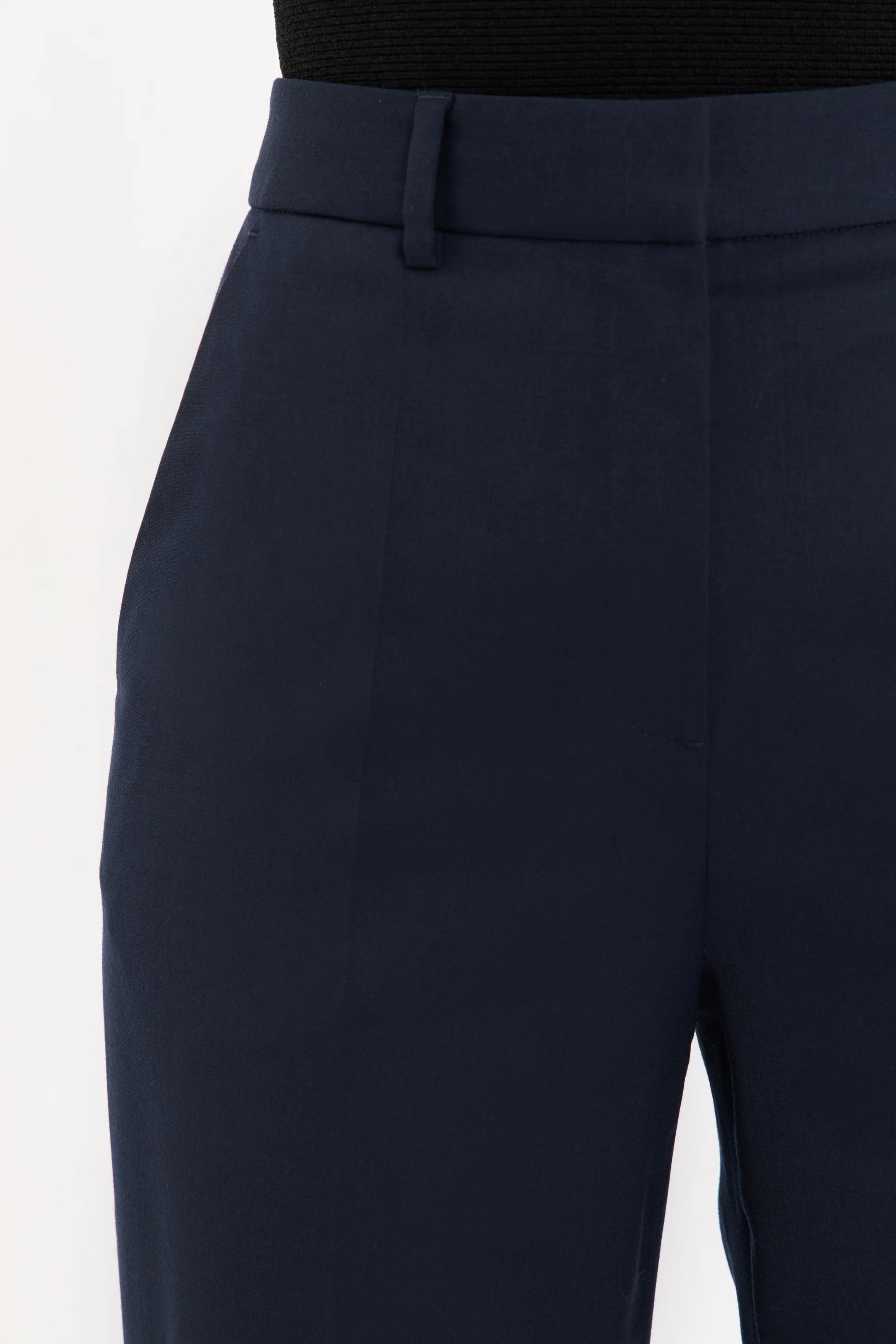 Navy blue pants on a white background