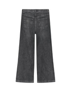 Black jeans on a light gray background