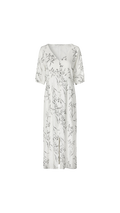White dress with floral pattern on a white background