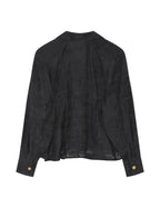 Black blouse with gold buttons on a white background