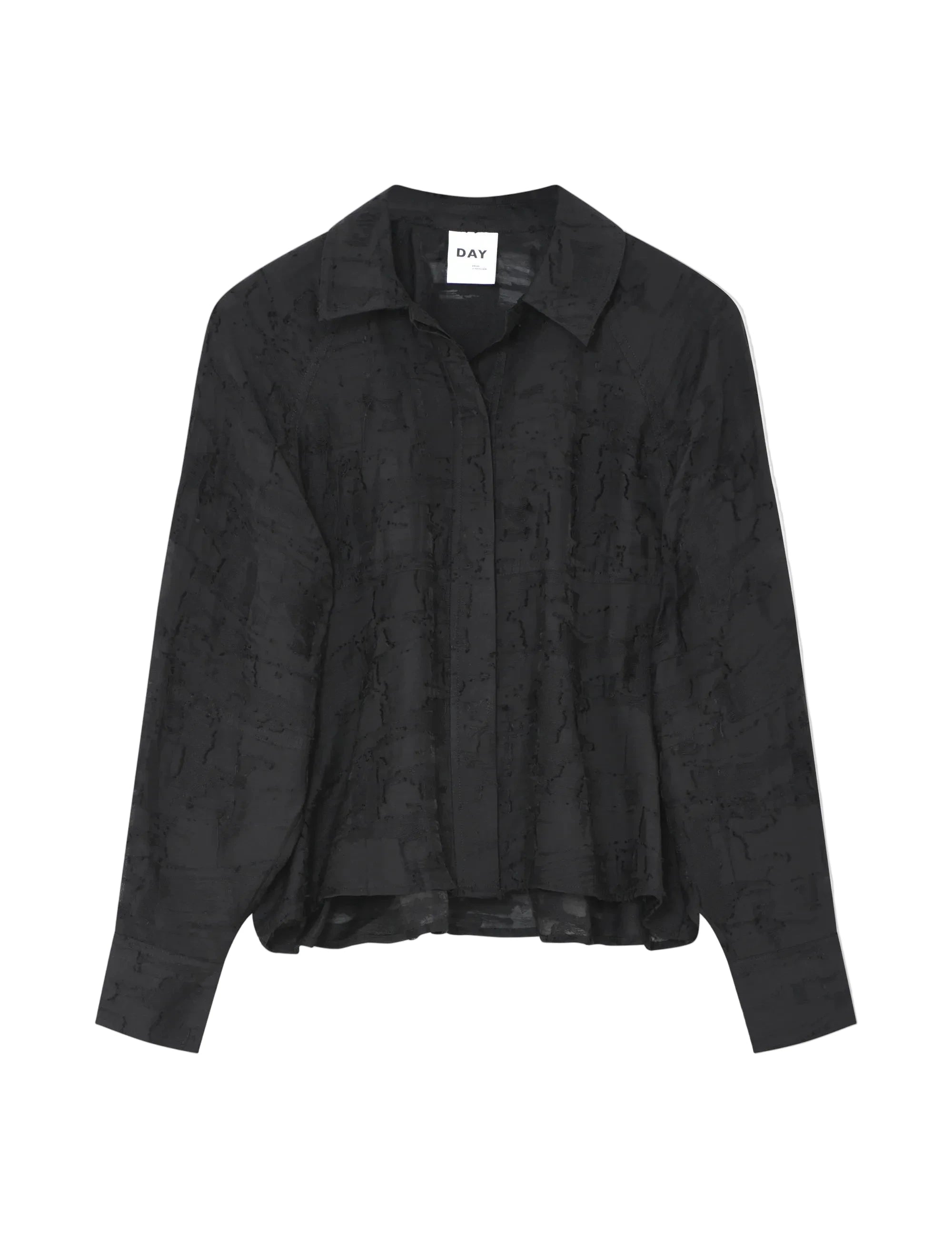 Black textured shirt on a light gray background