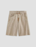 Beige denim shorts on a light gray background