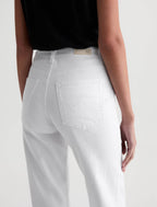 White jeans worn by a person on a white background
