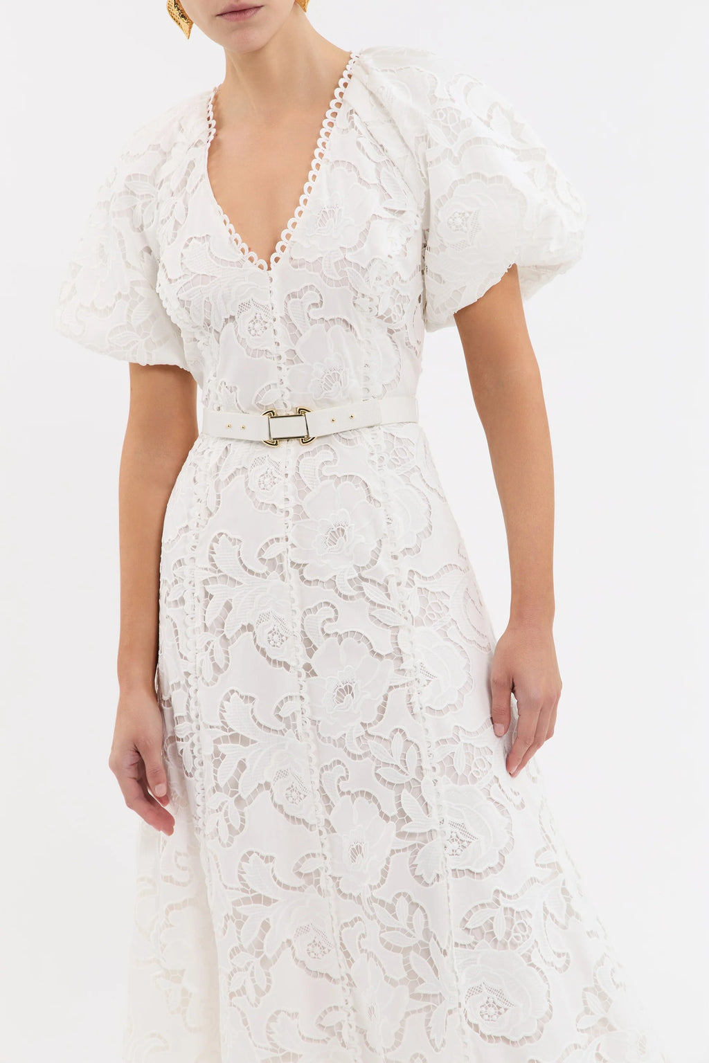 White lace dress with a belt on a white background