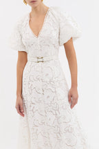White lace dress with a belt on a white background