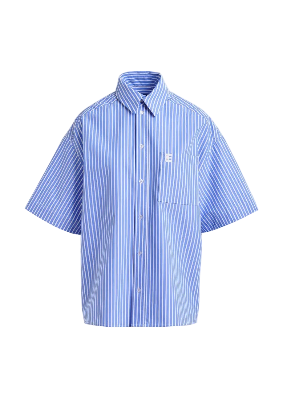 Blue and white striped shirt with a logo on a light gray background