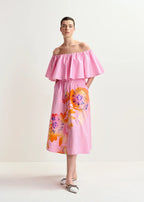 A model wearing an off-the-shoulder, striped, pink midi-length skirt with floral foil print, featuring an elasticated waistband with drawstring and box pleat details.