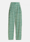 Green and white patterned pants on a light gray background