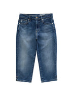A pair of medium wash blue denim jeans with whiskering and subtle fading on the thighs, laid flat against a light gray background.