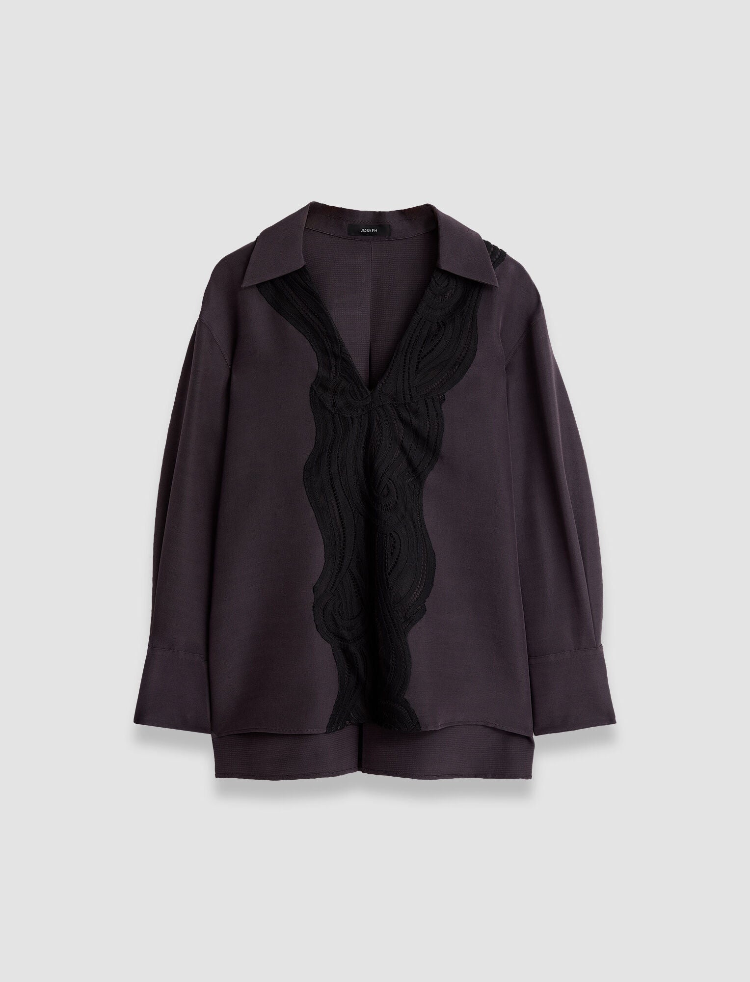  Madrid Blouse is a relaxed fit silk and lace blouse, exquisitely crafted from a luxurious blend of wool and silk gazar. 