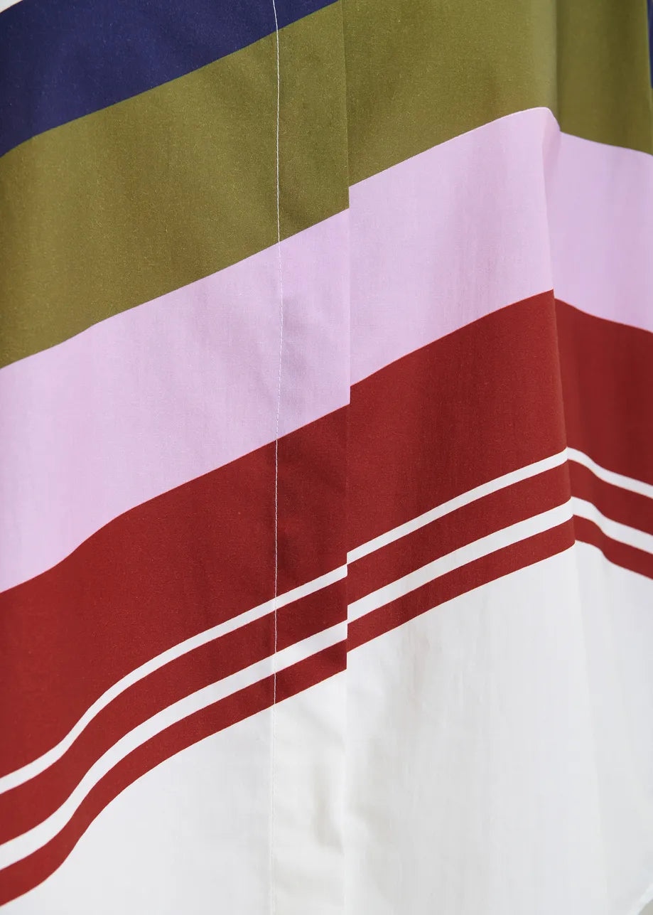 Close-up of fabric with multicolor stripes on a white background