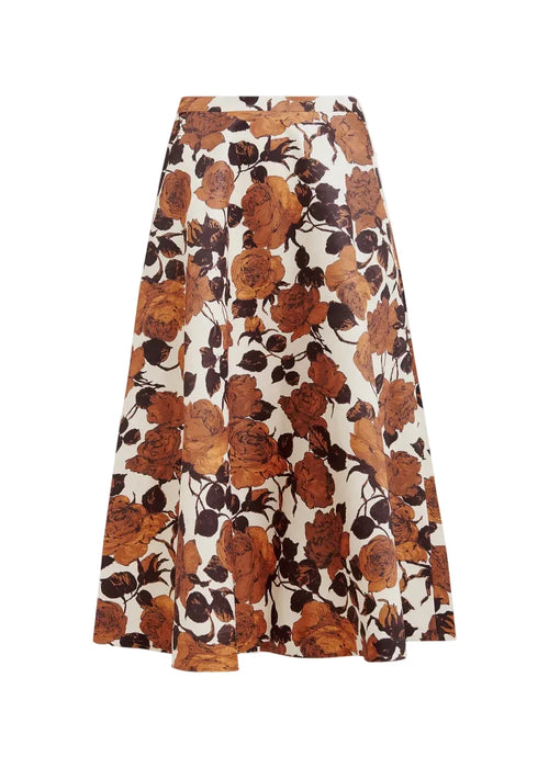 Floral patterned skirt with brown and orange flowers on a white background