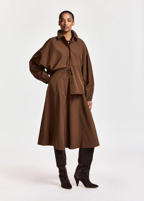 KEELY2-BA08

Essentiel Antwerp woven from a lustrous recycled-polyester fabric with a subtle sheen, this midi-length skirt is designed in an A-line silhouette topped with a comfortable, elasticated waistband.