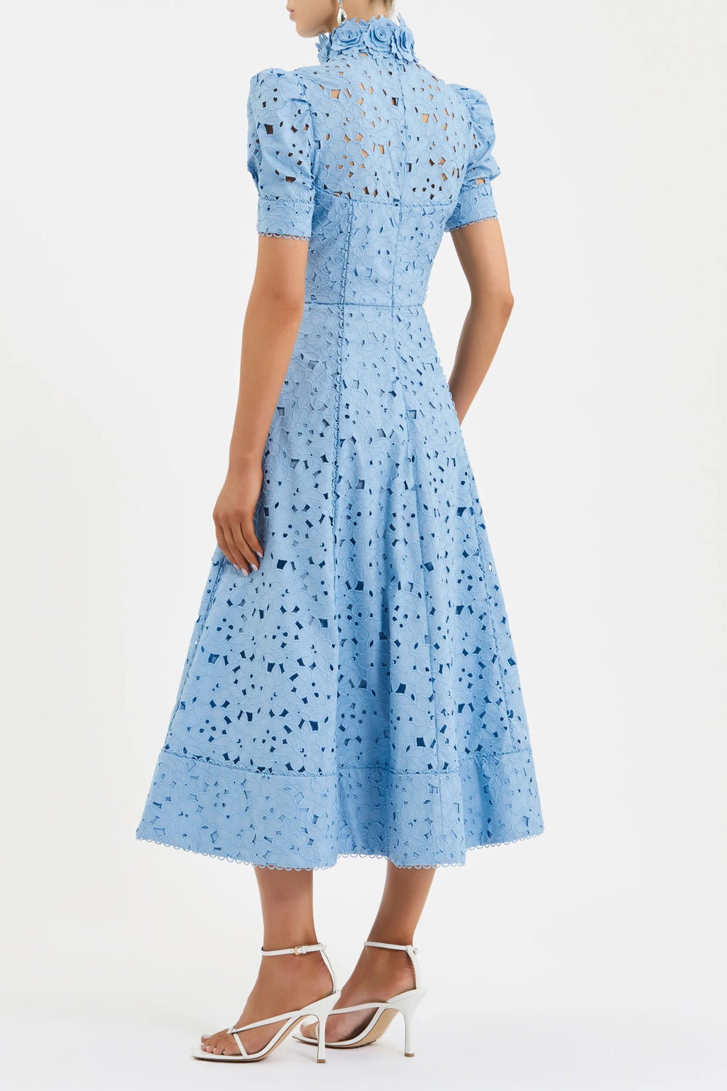 Light blue dress with floral pattern on a white background