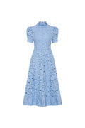 Light blue dress with a subtle pattern on a white background