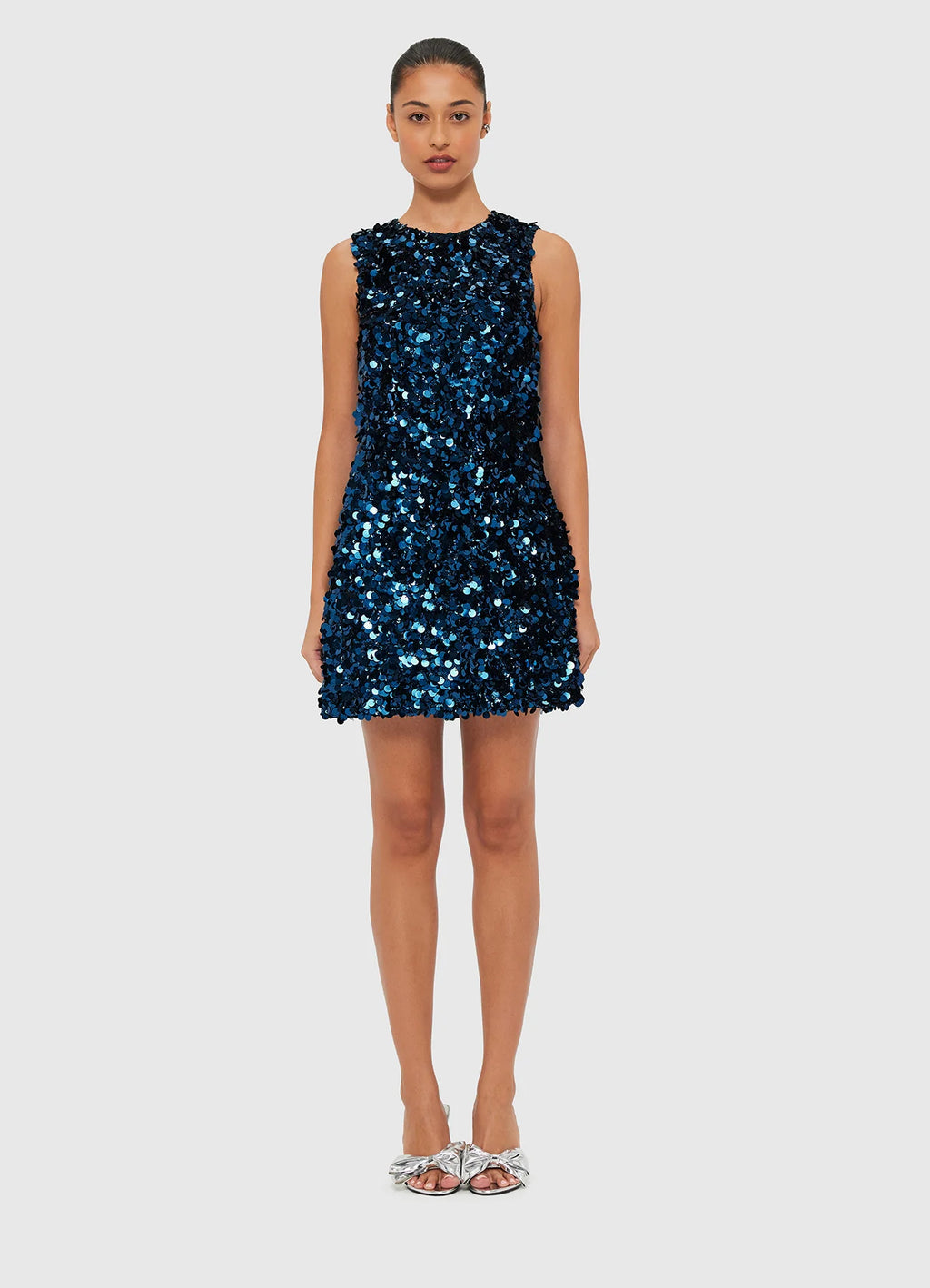 Women wearing LEO LIN midnight blue sequin mini dress with a high scoop neckline and sleeveless design.