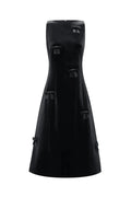 A black strapless midi dress with structured, boxy panel details and tassel-like accents, shown against a plain light gray background.