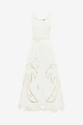White dress with gold embroidery on a white background