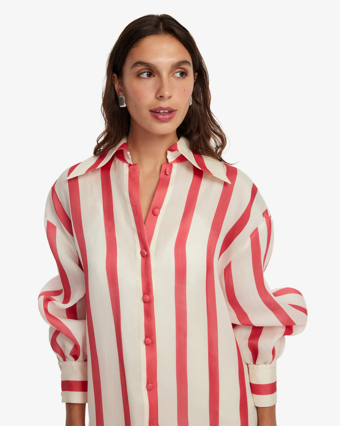 Woman wearing a red and white striped shirt on a white background