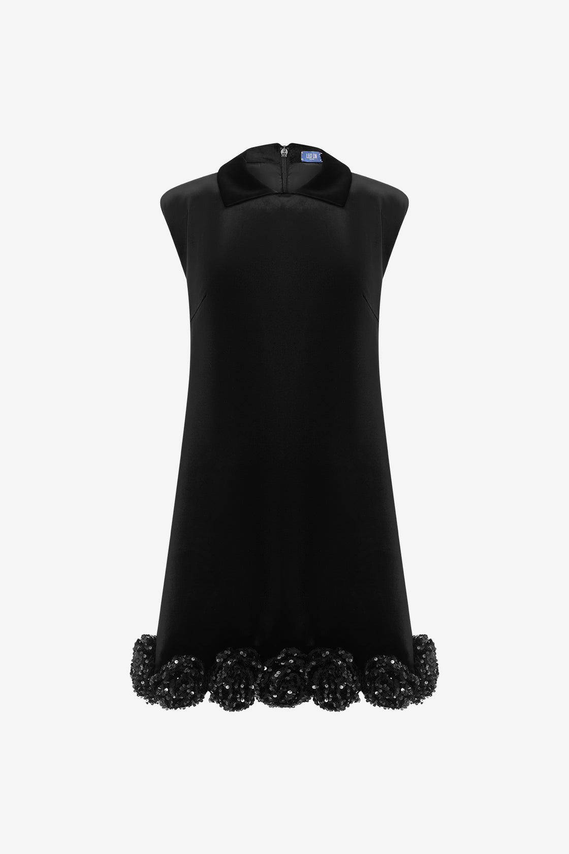 Black sleeveless dress with decorative hem on a white background