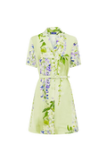 A cascading lilac dream! These beautiful lilac wisteria blooms tumble down a soft lime canvas. This print evokes pure fresh air, and feels like floating through a tranquil, sun-drenched garden on the first day of spring.

Premium linen blend mini dress
Exclusive LEO LIN Wisteria Print
Collared neckline
Short sleeves
Front button opening
A-line mini skirt
Matching belt included
