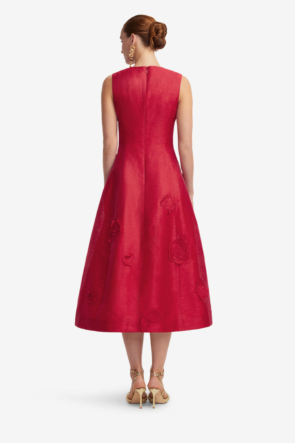 Red dress with floral details on a white background
