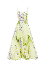 A cascading lilac dream! These beautiful lilac wisteria blooms tumble down a soft lime canvas. This print evokes pure fresh air, and feels like floating through a tranquil, sun-drenched garden on the first day of spring.

Premium silk linen midi dress
Sweetheart neckline
Thin shoulder straps
A-line silhouette LEO LIN
Elasticated ruched back
Invisible back zip closure
Fully lined
Matching floral belt included