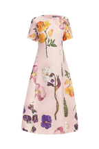 A playful scattering of detailed wildflowers in vibrant purple, orange, and white bloom across a delicate pink base. Sparkling, intricate, and bursting with whimsical charm.

Premium linen blend midi dress
Exclusive LEO LIN Wildbloom Print
Round neckline
Short sleeves
Fitted waist
A-line silhouette
Invisible back zip closure
Fully lined