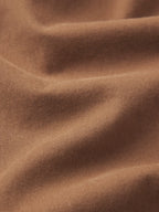 Close-up of brown fabric with visible texture