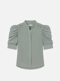 A sage green, short-sleeved, button-up shirt with ruffled detailing at the sleeves.