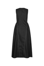 A sleeveless black midi dress shown from the back, featuring a structured bodice and gathered skirt with contrasting light-colored piping details, set against a plain white background.
