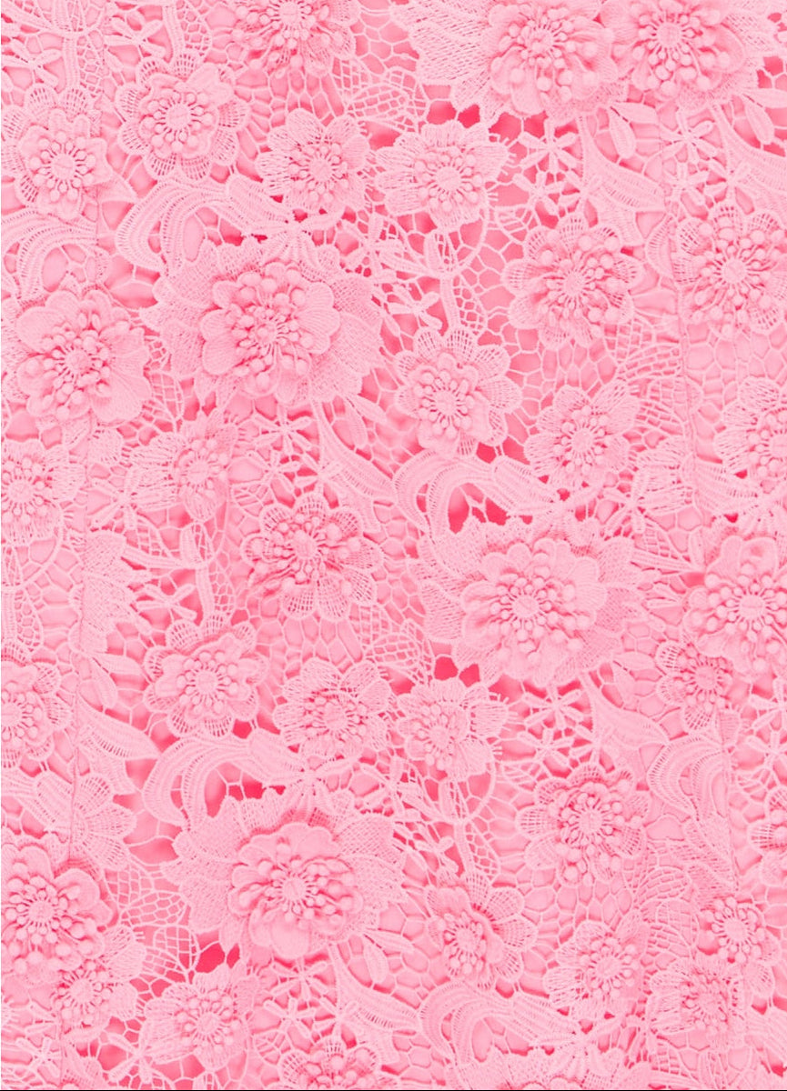Pink lace pattern on a white background
