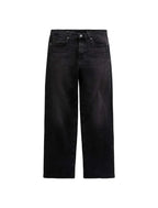 Black jeans on a light gray background