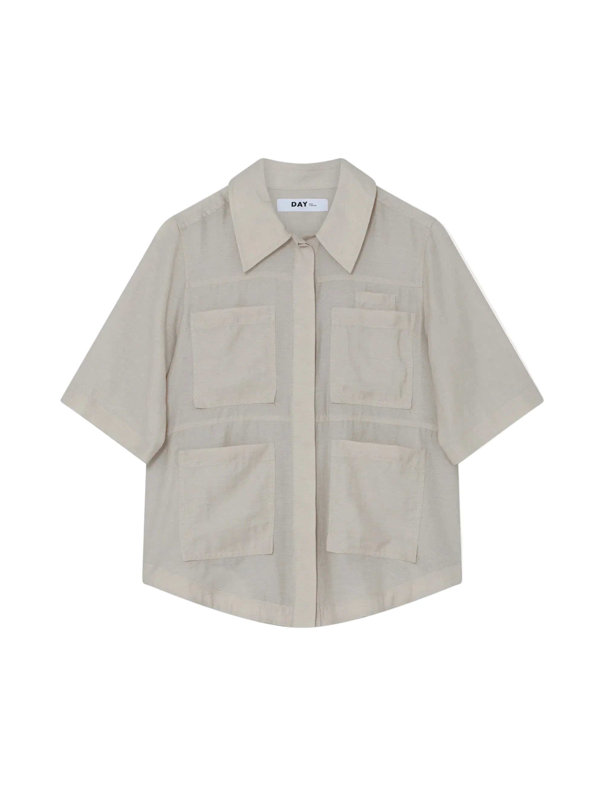 Beige shirt with pocket details on a white background mina shirt day Birger 
