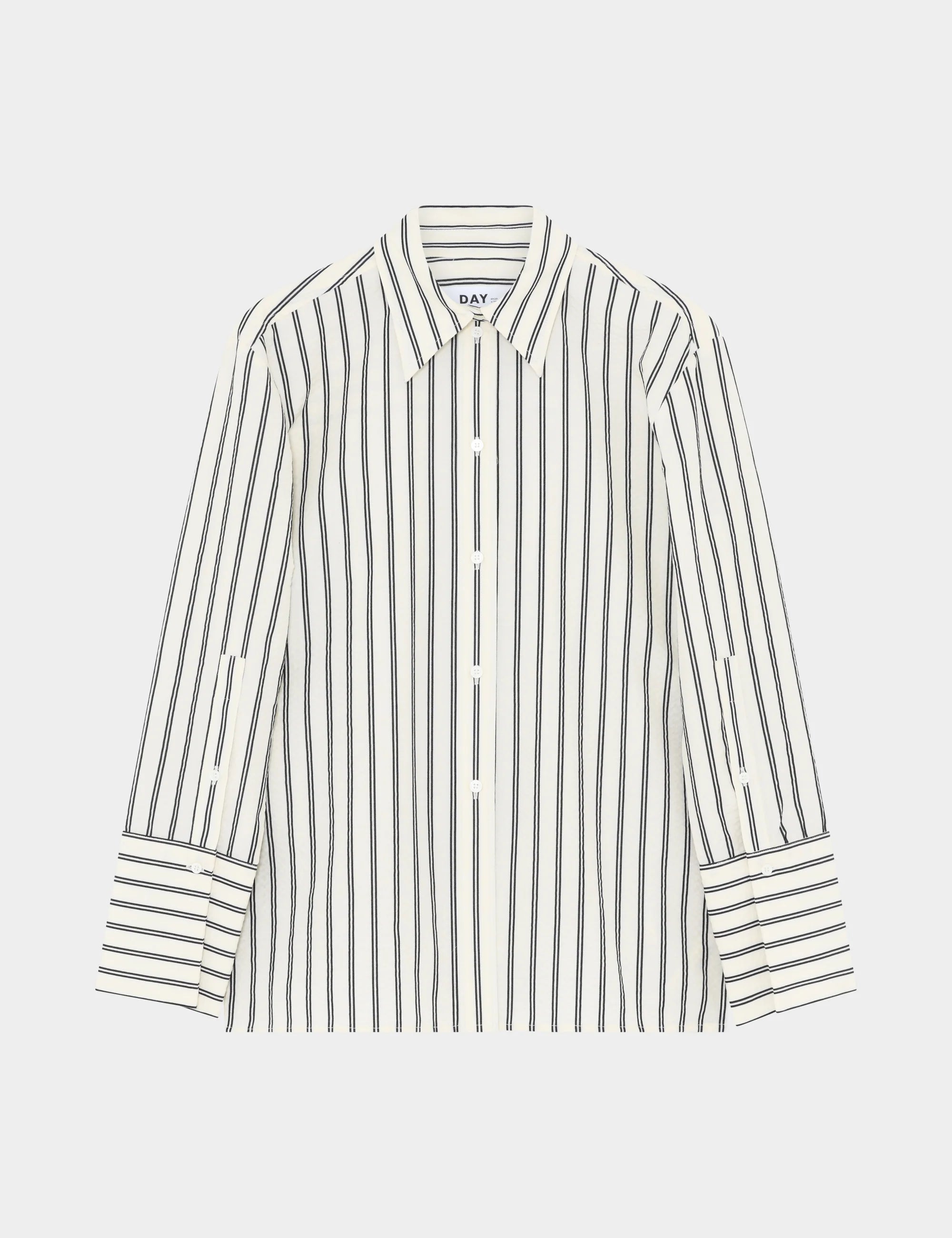Striped shirt with 'GANT' branding on a light gray background