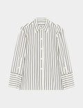 Striped shirt with 'GANT' branding on a light gray background