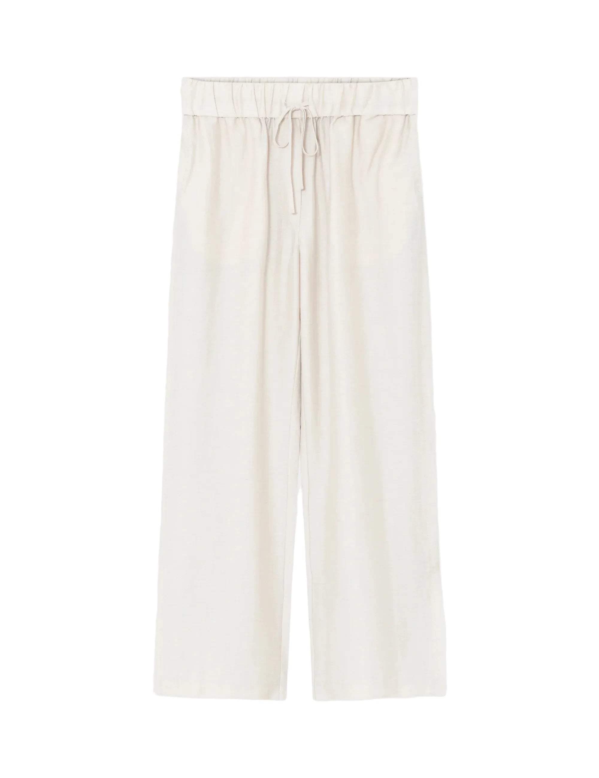 White pants on a light beige background