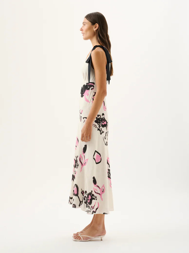 Woman wearing a floral dress on a white background