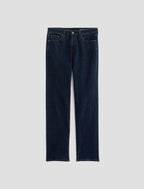 Dark blue jeans on a light gray background