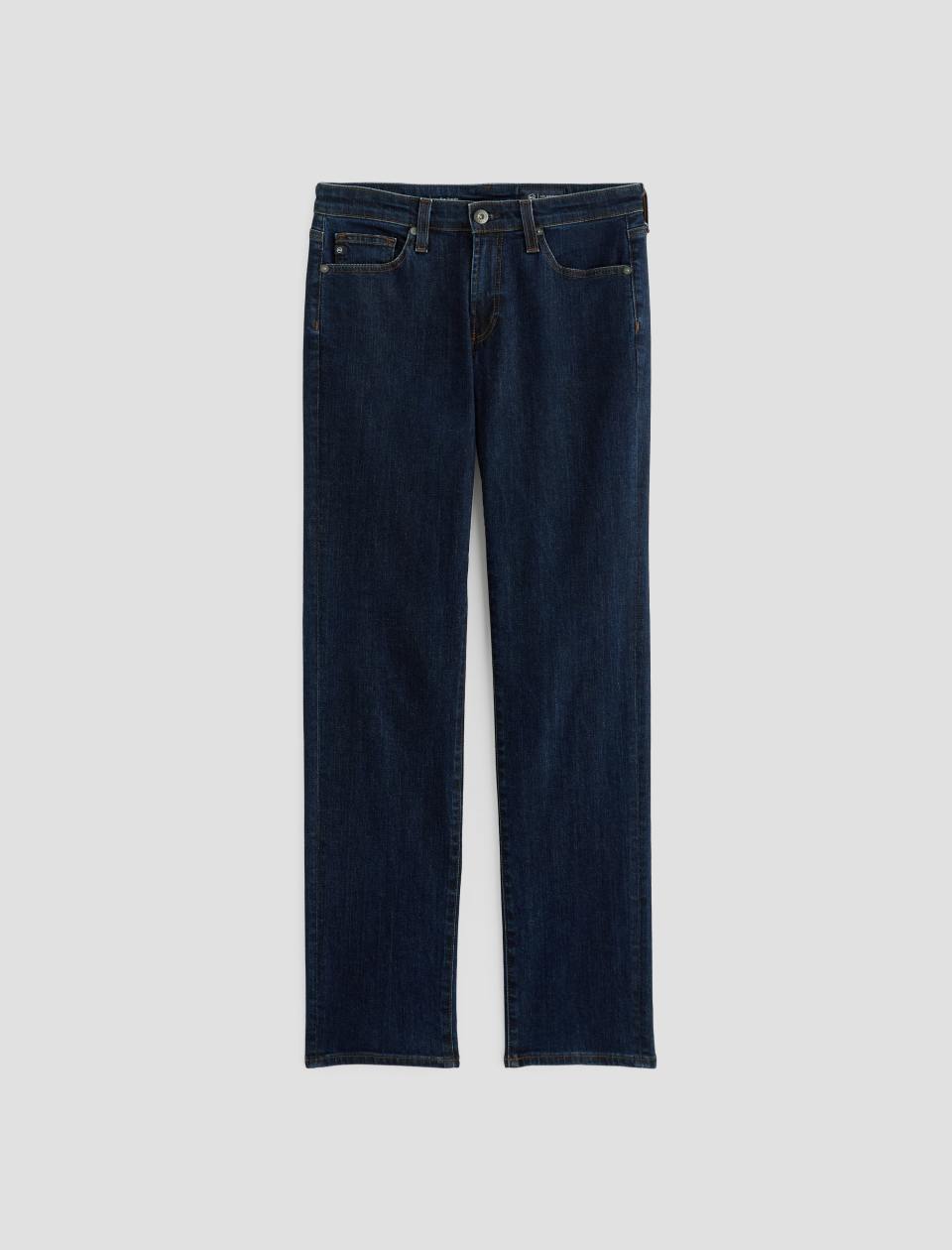 Dark blue jeans on a light gray background