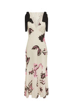 Floral dress with black accents on a white background