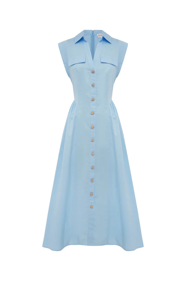 Light blue sleeveless dress with buttons on a white background