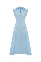 Light blue sleeveless dress with buttons on a white background