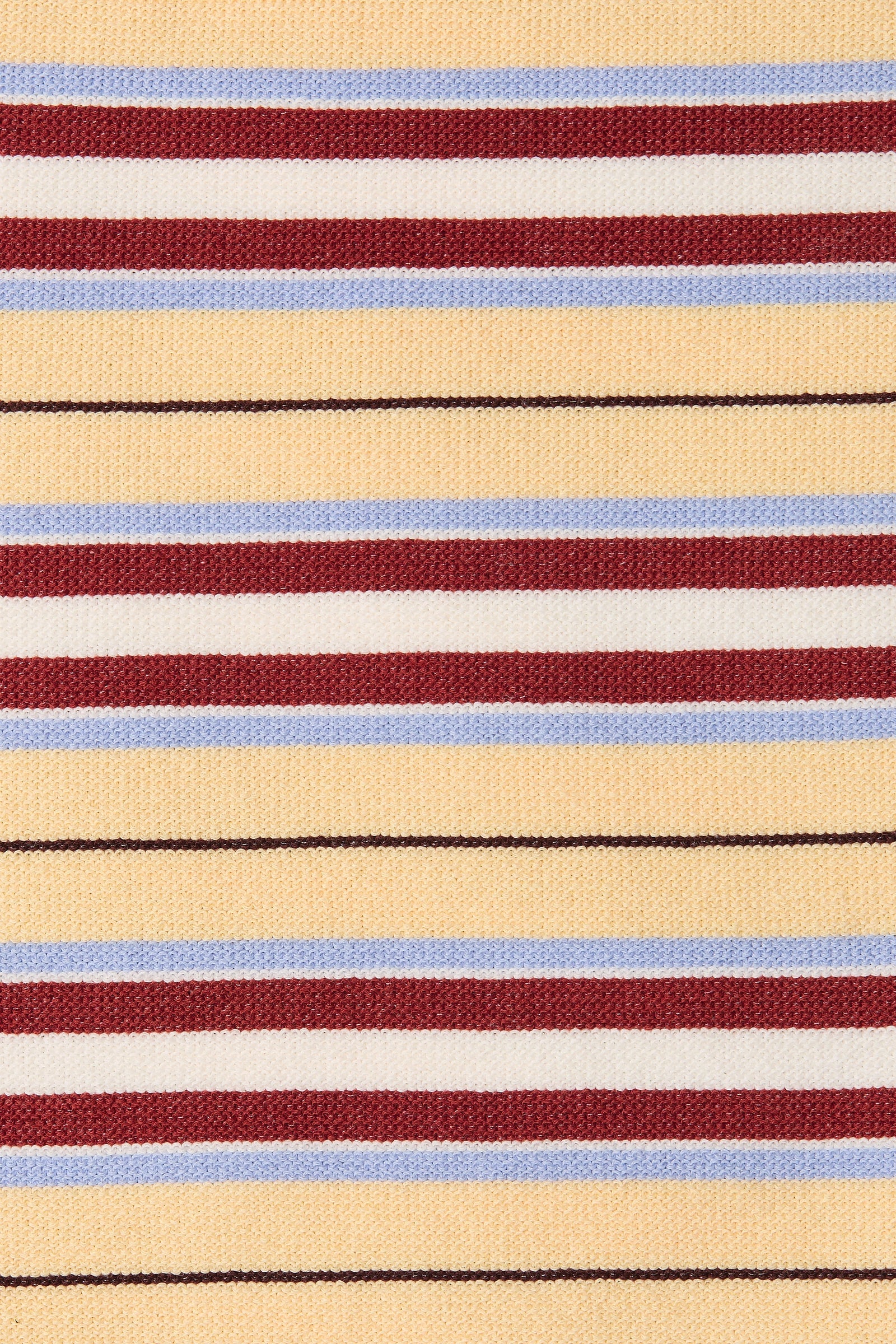 A close-up of a striped woven fabric with horizontal bands of pale yellow, burgundy red, white, light blue, and thin black lines.
