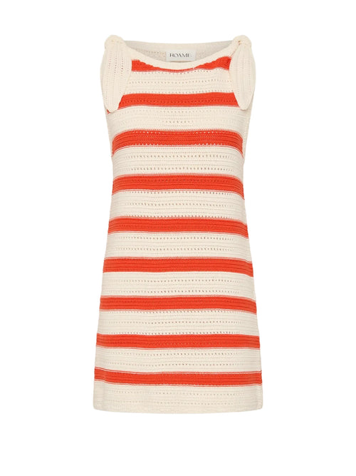 A sleeveless knit mini dress with horizontal orange-red and cream stripes, featuring tie-shoulder straps and a crew neckline, shown against a light gray background.