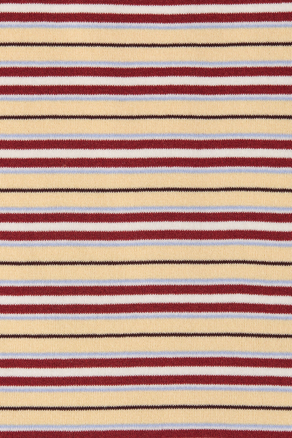 A close-up of a striped knit fabric with horizontal bands of beige, burgundy red, light blue, and thin black lines.