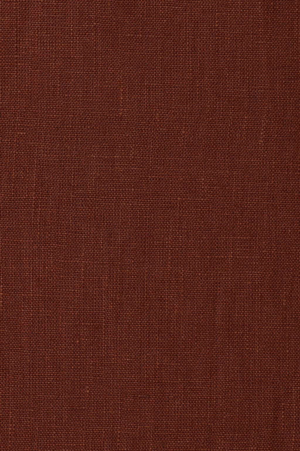 A close-up of a textured brown fabric surface with a fine woven pattern.