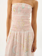 Pink strapless dress with floral pattern on a white background